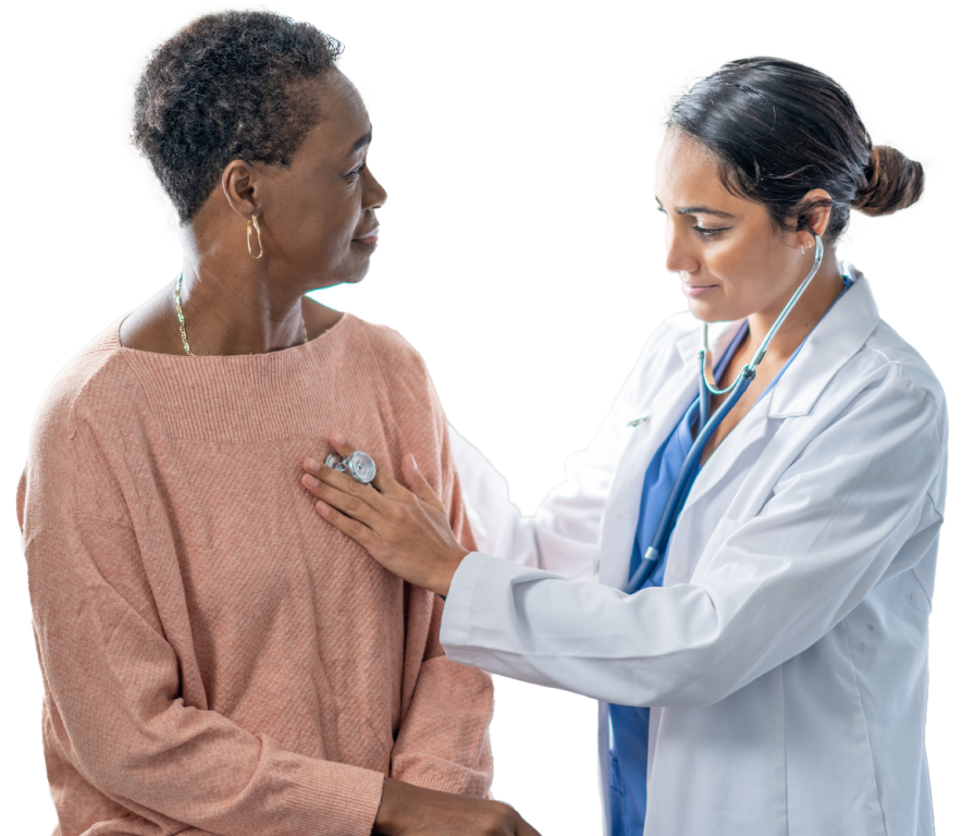 Female doctor checking a woman patient's heartbeat