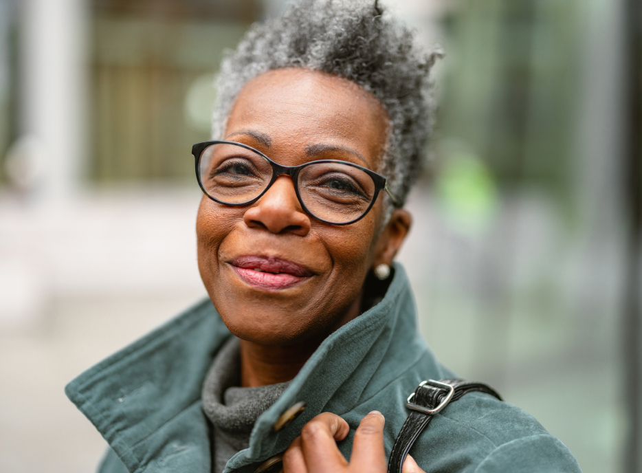Closeup of a middle aged woman with a big smile